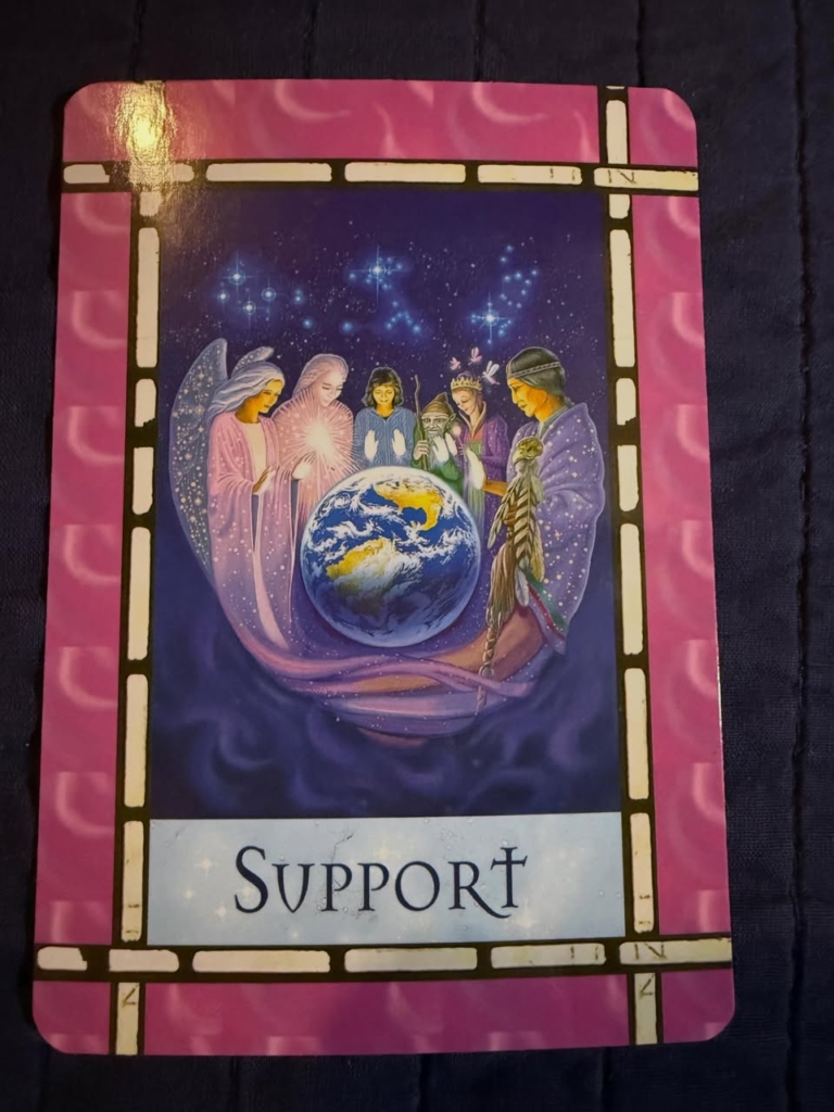 Image of a tarot card with the word support printed on it.